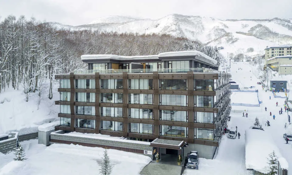 Aya niseko hirafu ski in ski out accommodation exterior and ski runs