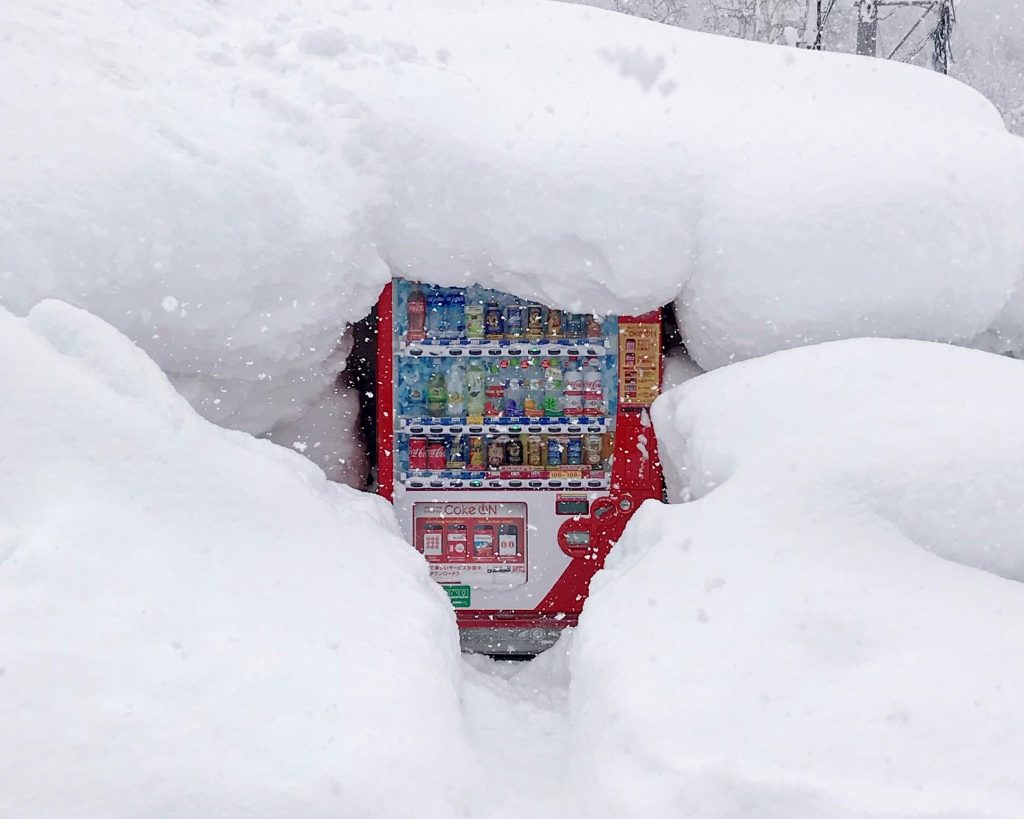 Why does it snow in Japan so much - vending machine covered in snow