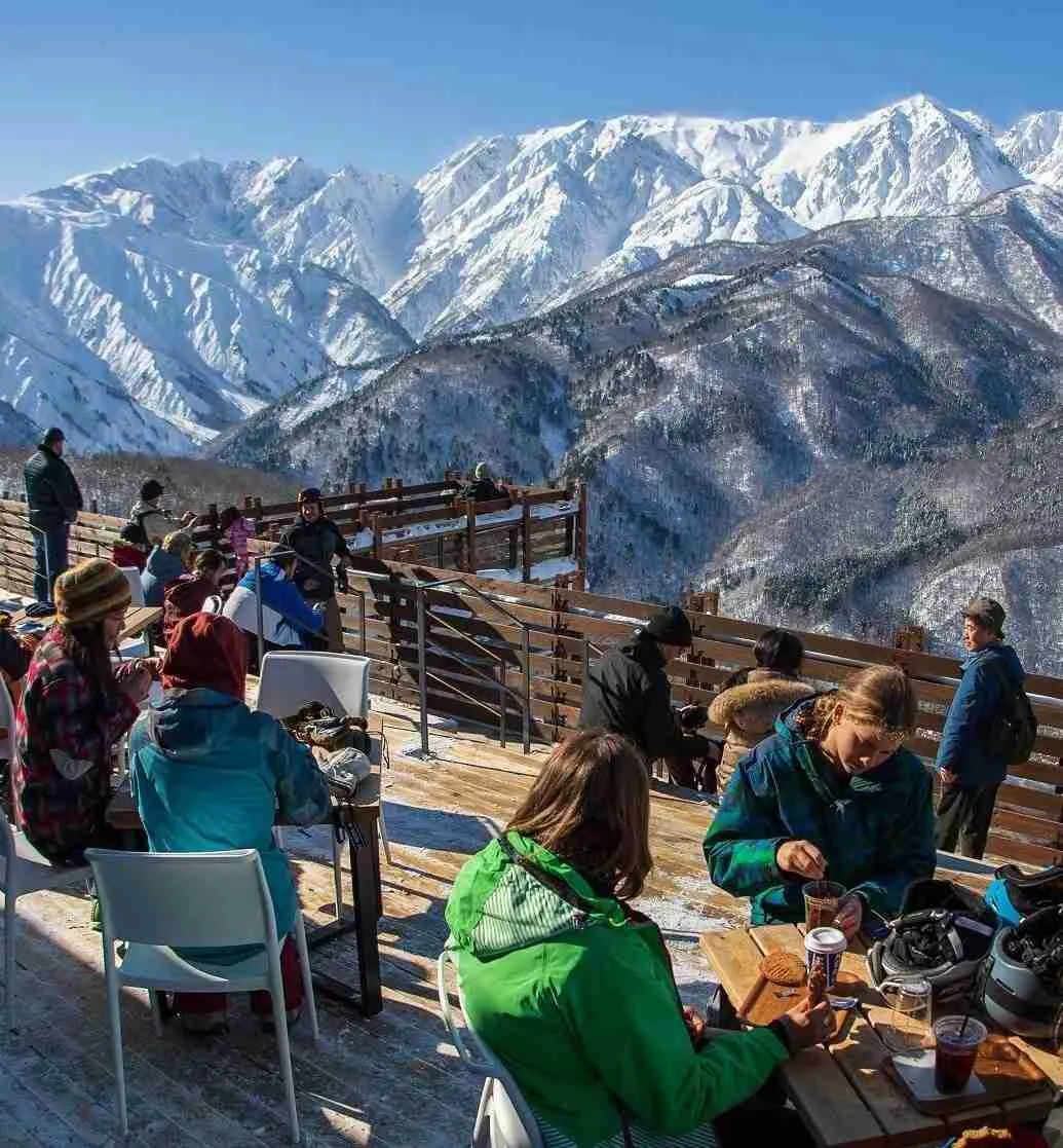 skiers and boarders relaxing at city bakery at hakuba mountain harbour iwatake
