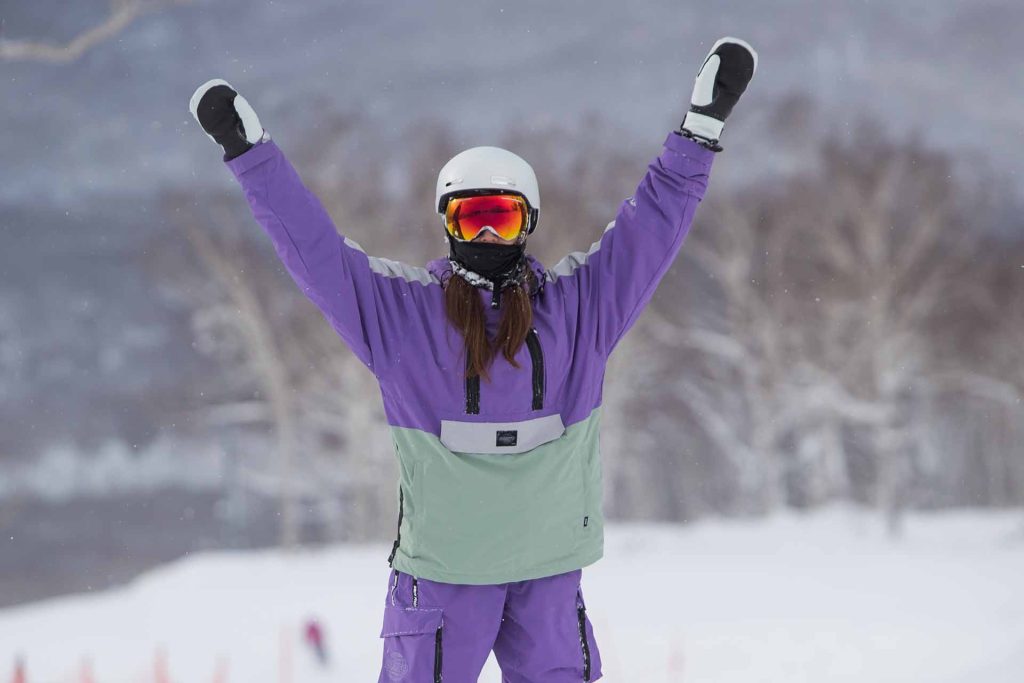 Person having fun in the snow in Japan